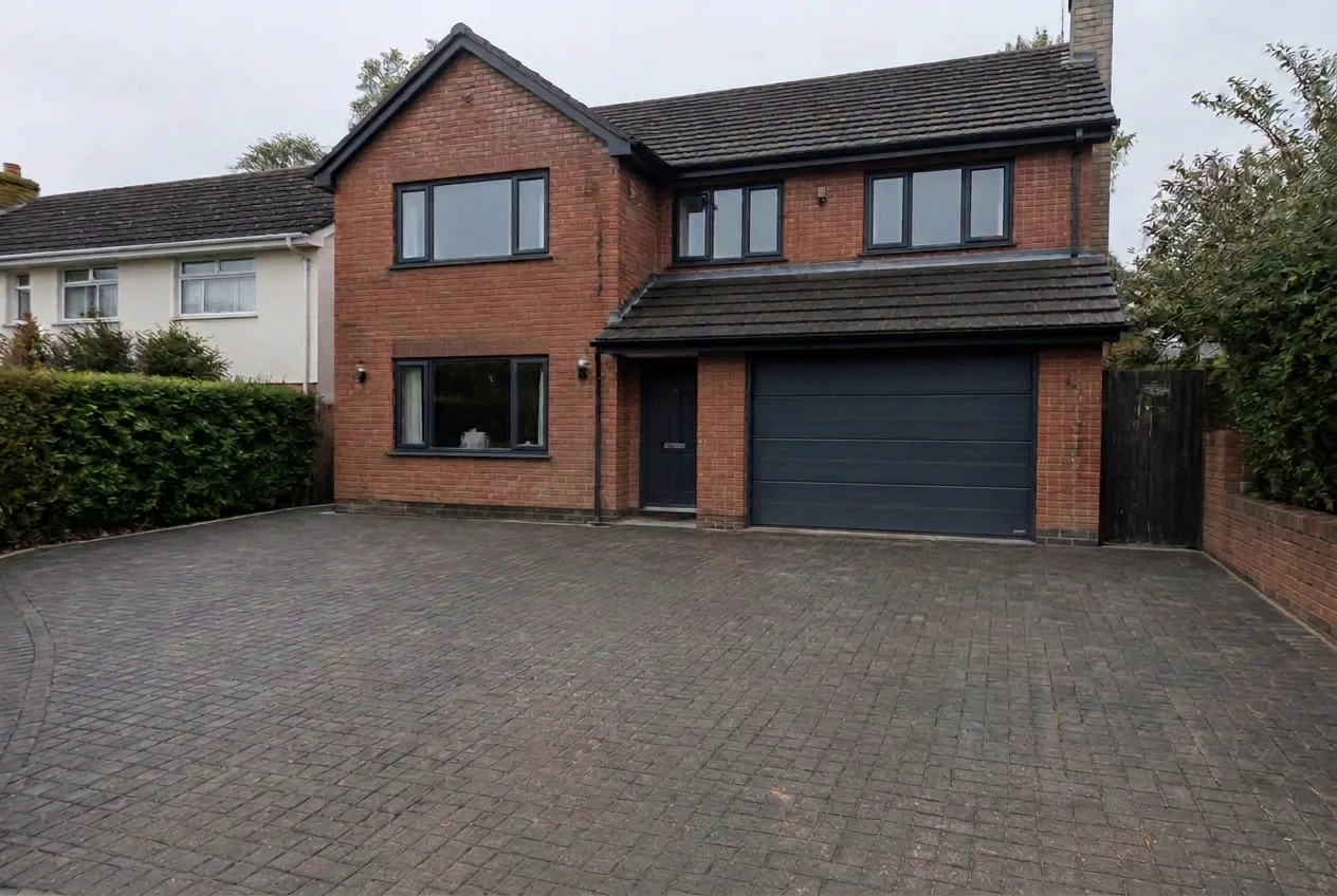 Completely clear block paved driveway in front of the house after AI Clear Exterior Space