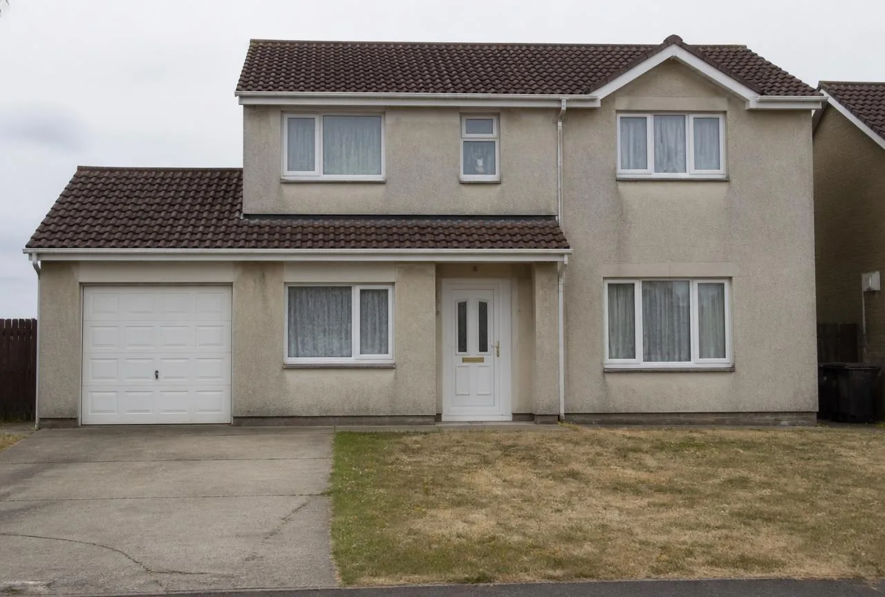 Dated suburban house facade before AI Exterior Redesign