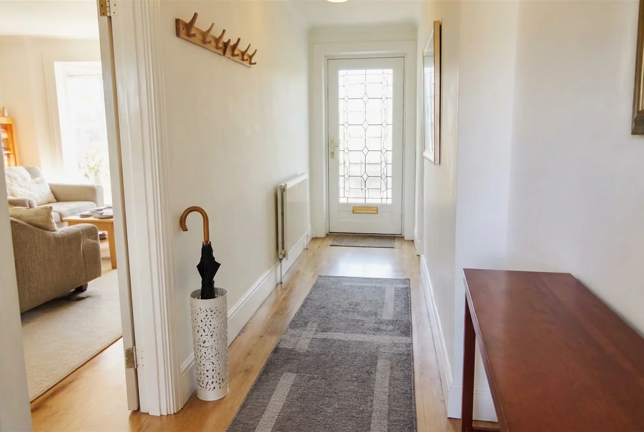 Open hallway after AI Virtual Decluttering removed shoes, coats and bags