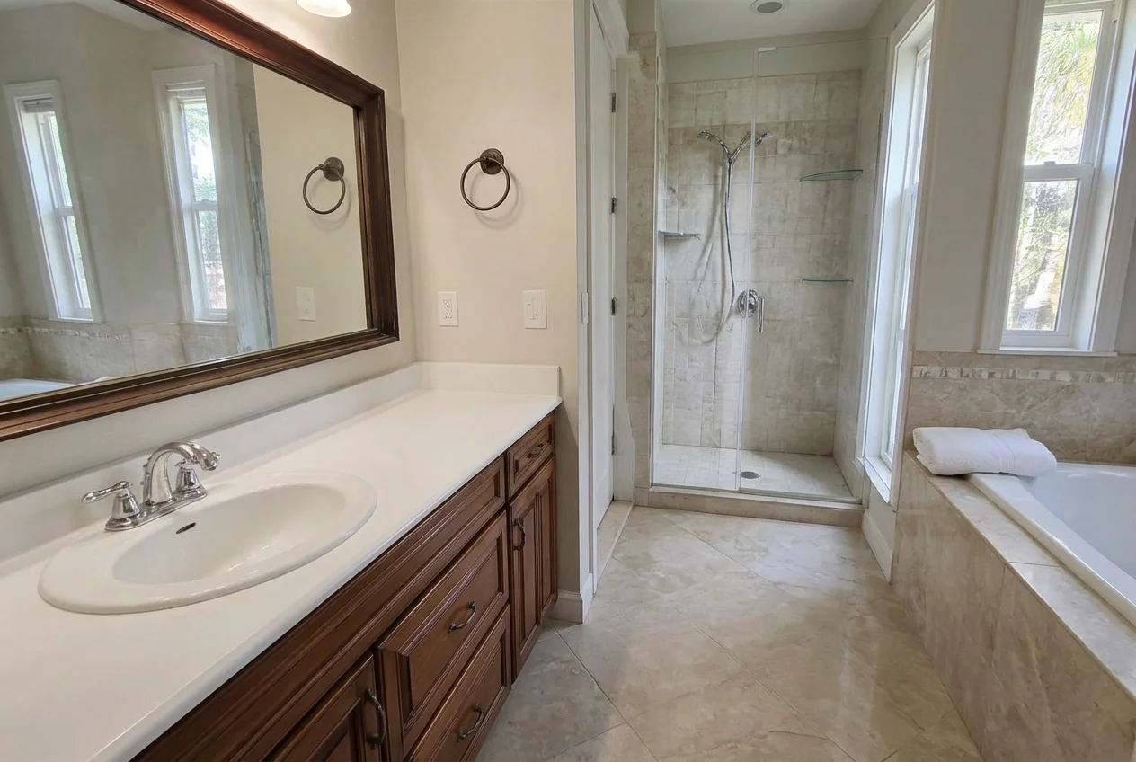 Spa-like bathroom after AI Virtual Decluttering removed toiletries and towels